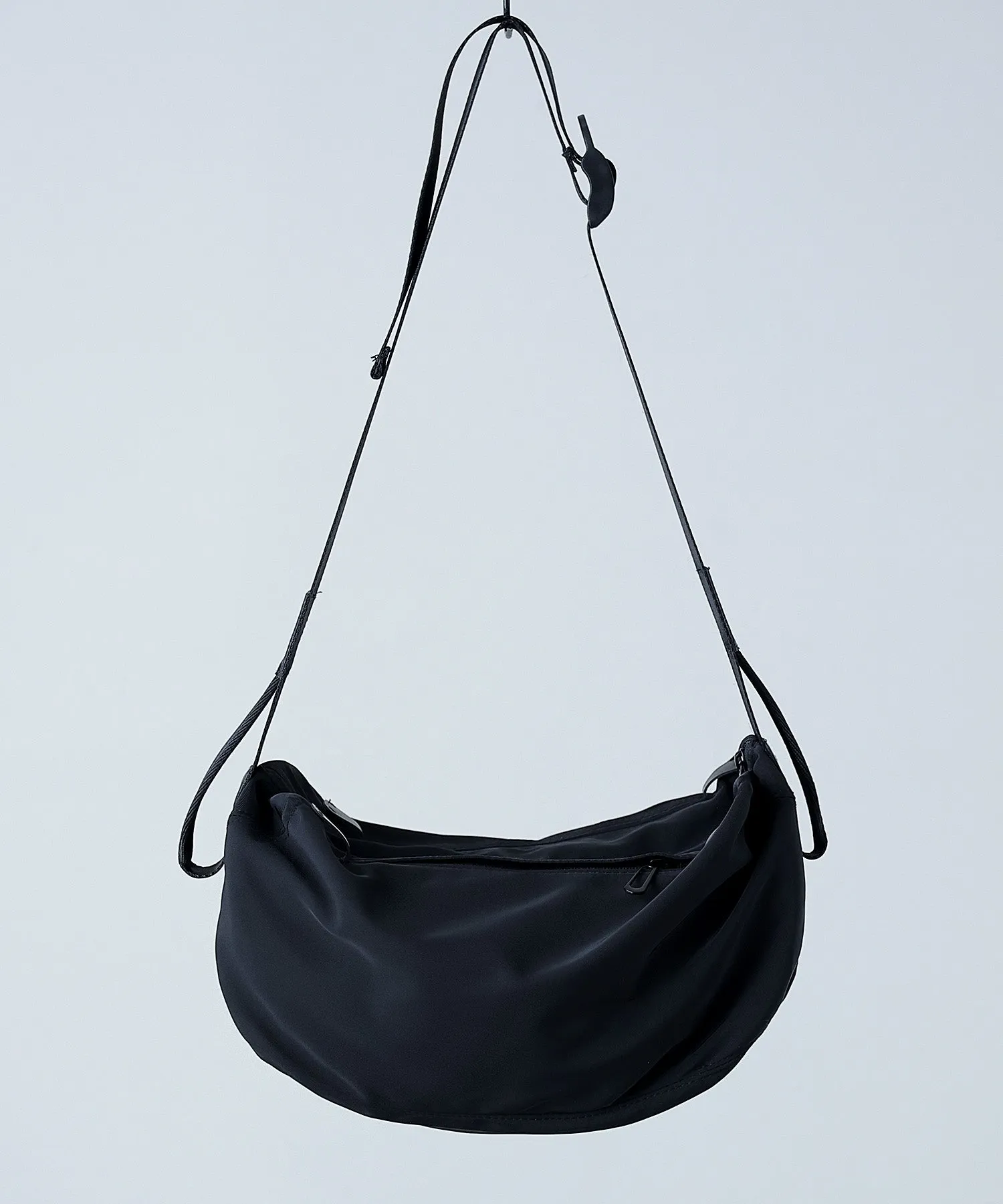 Half moon shoulder bag